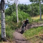 GVYC Gravity Grom racer in the aspen trees of Powderhorn